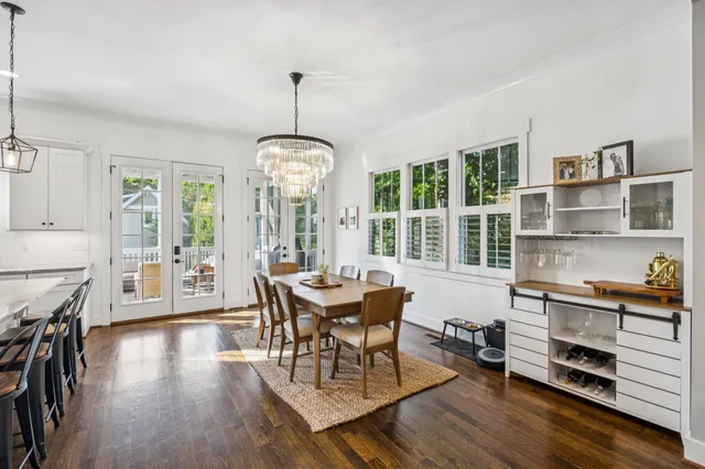 a dining room with furniture window wooden floor