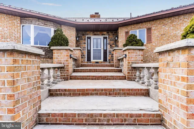 a living room with a couch and a flat screen tv