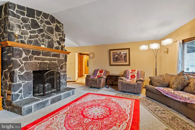 a view of a swimming pool with a yard