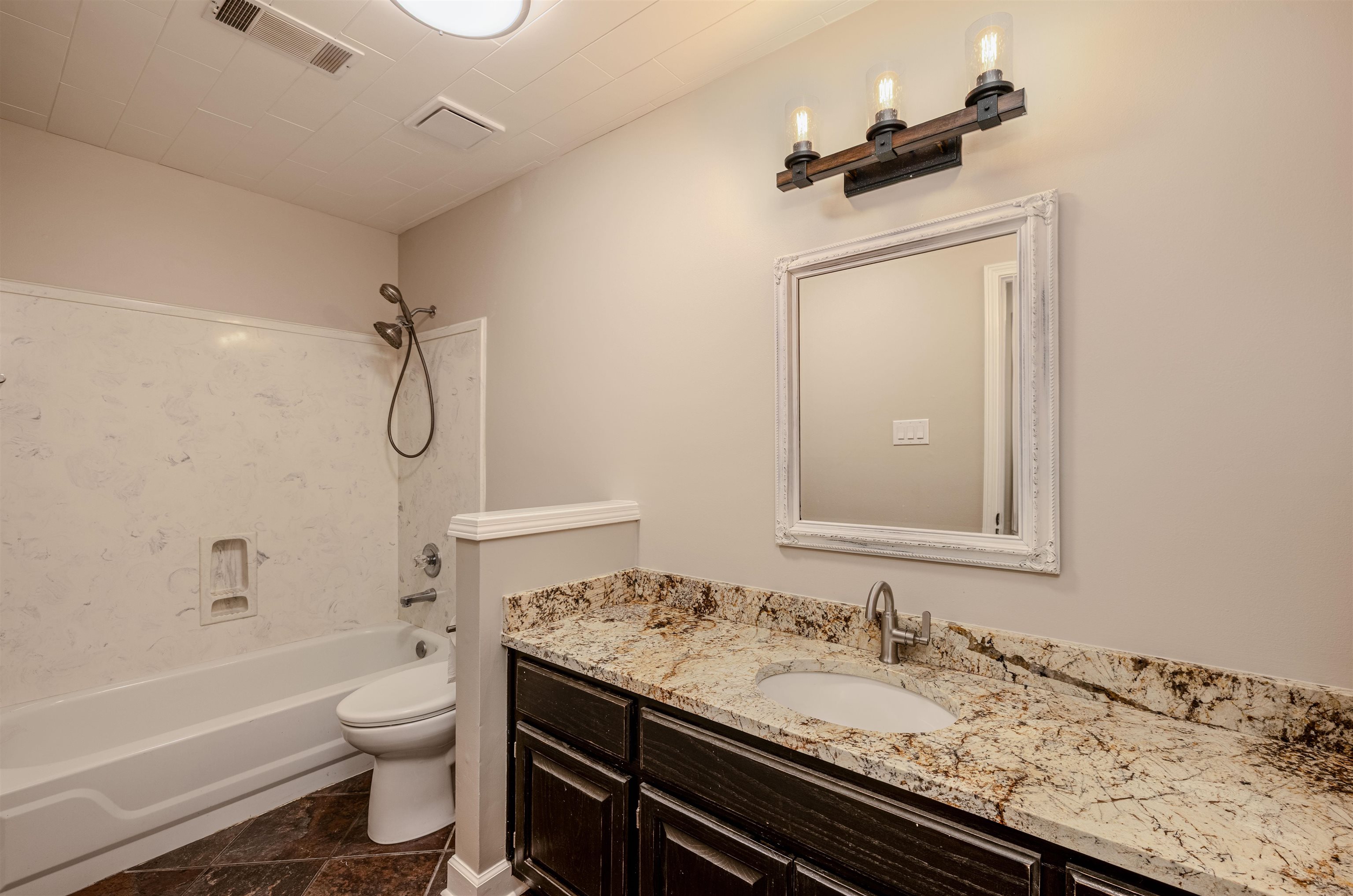 4808 Oak Road Bartlett, TN 38002 - Photo 17 of 35 Bathroom 2 downstairs featuring shower / washtub combination and vanity