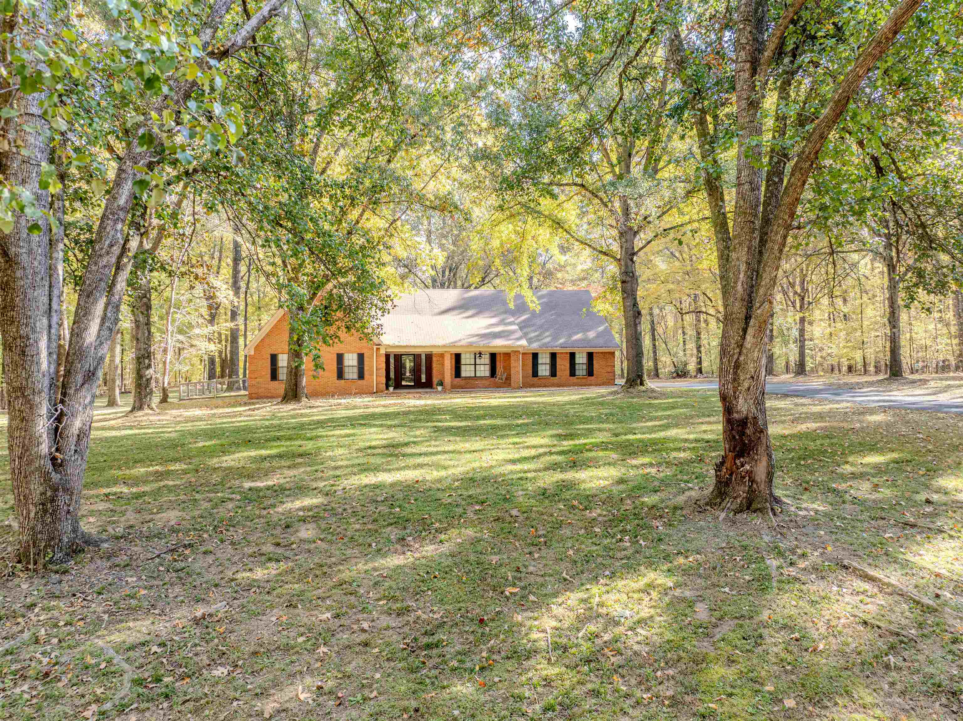 4808 Oak Road Bartlett, TN 38002 - Photo 23 of 35 Ranch-style home featuring brick siding, a front lawn, and covered porch on 4 acres