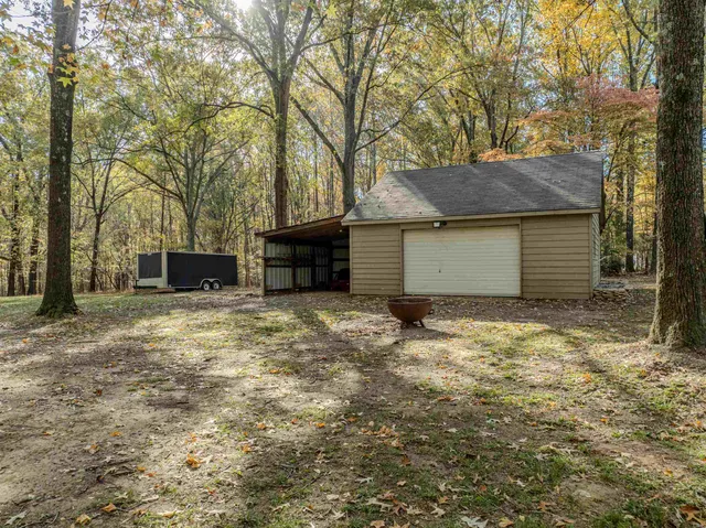 a house with trees in the background