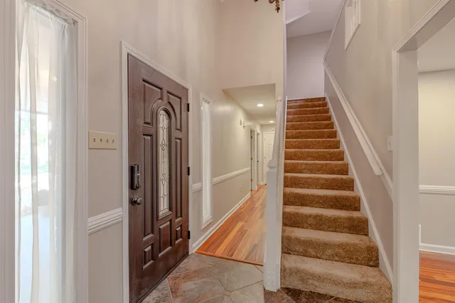 a view of an entryway with staircase
