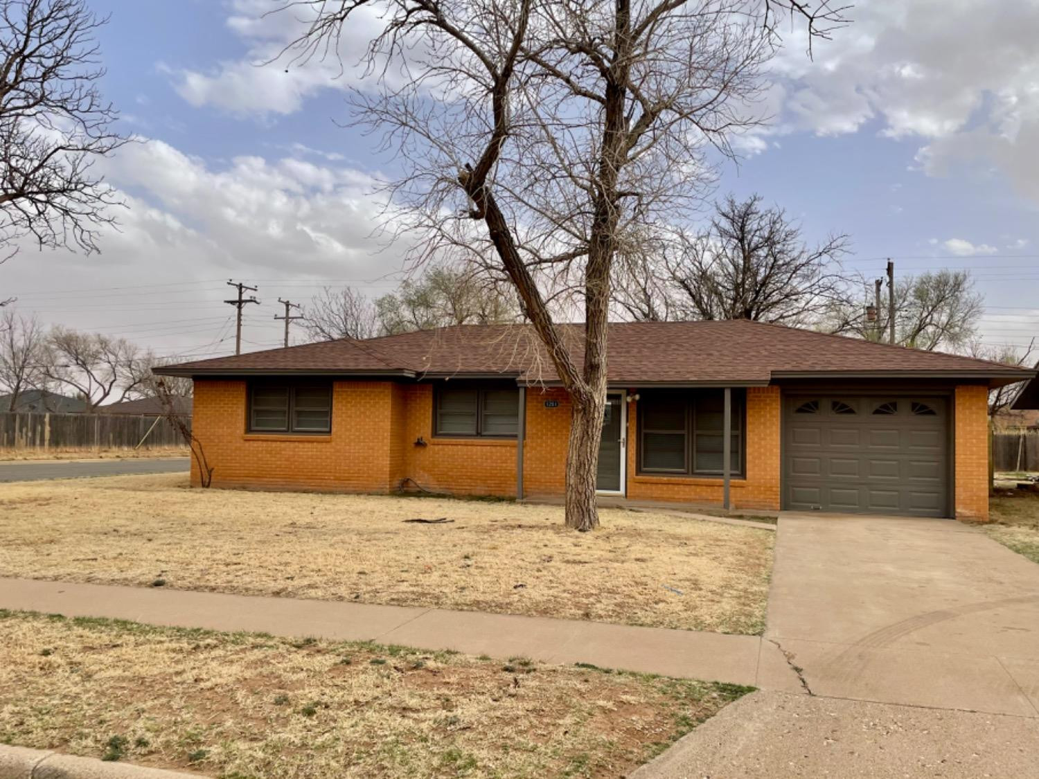 a house with trees in the background