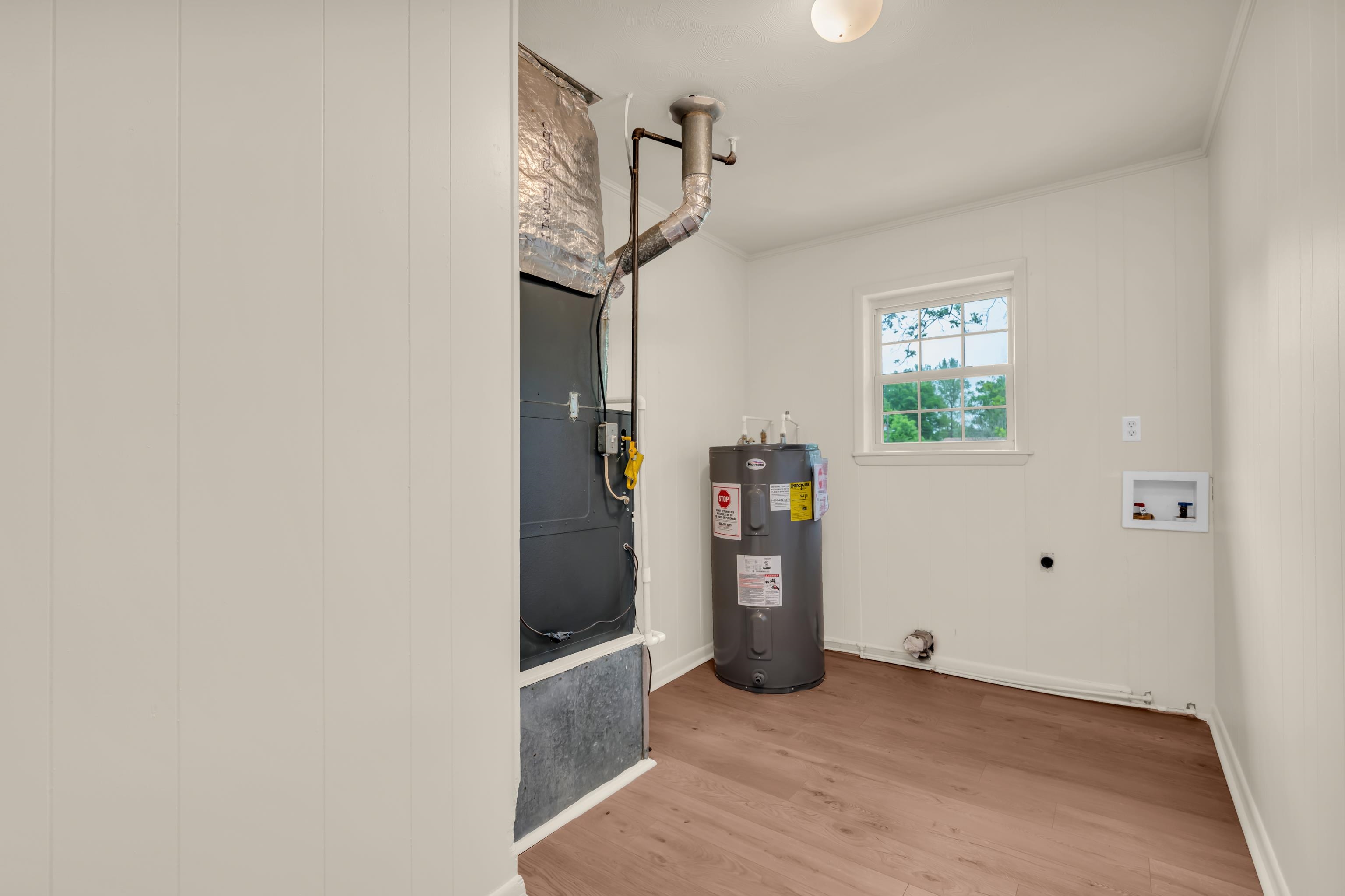 400 Coffee Shop Road Ripley, TN 38063 - Photo 16 of 23 a view of a livingroom with wooden floor and a window