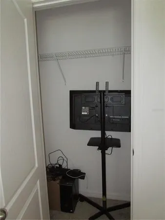 a bathroom with a shower and a sink