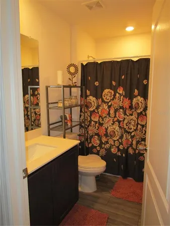 a bathroom with a sink and a toilet