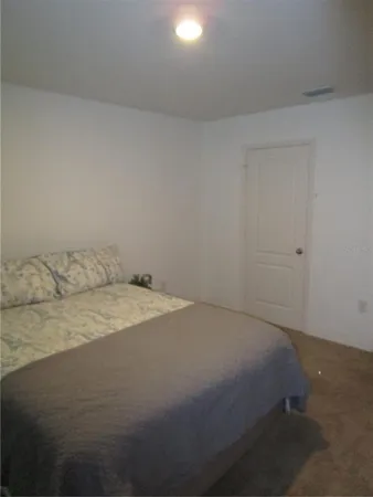 a bed room with a bed