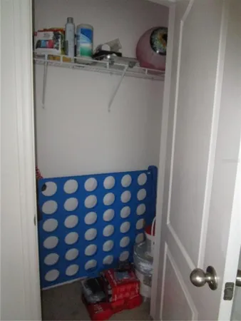 a close view of a sink and cabinets