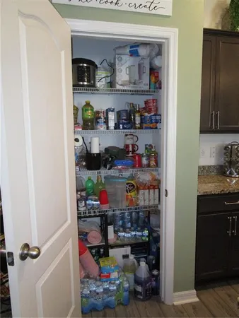 a room with lots of bottles of alcohol