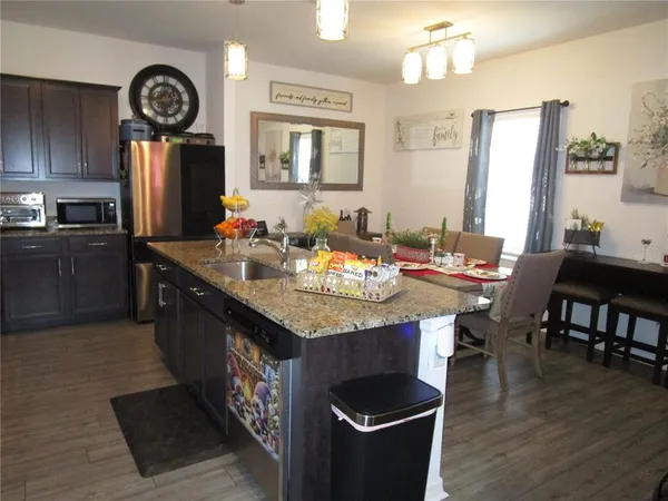 a kitchen with granite countertop lots of counter top space