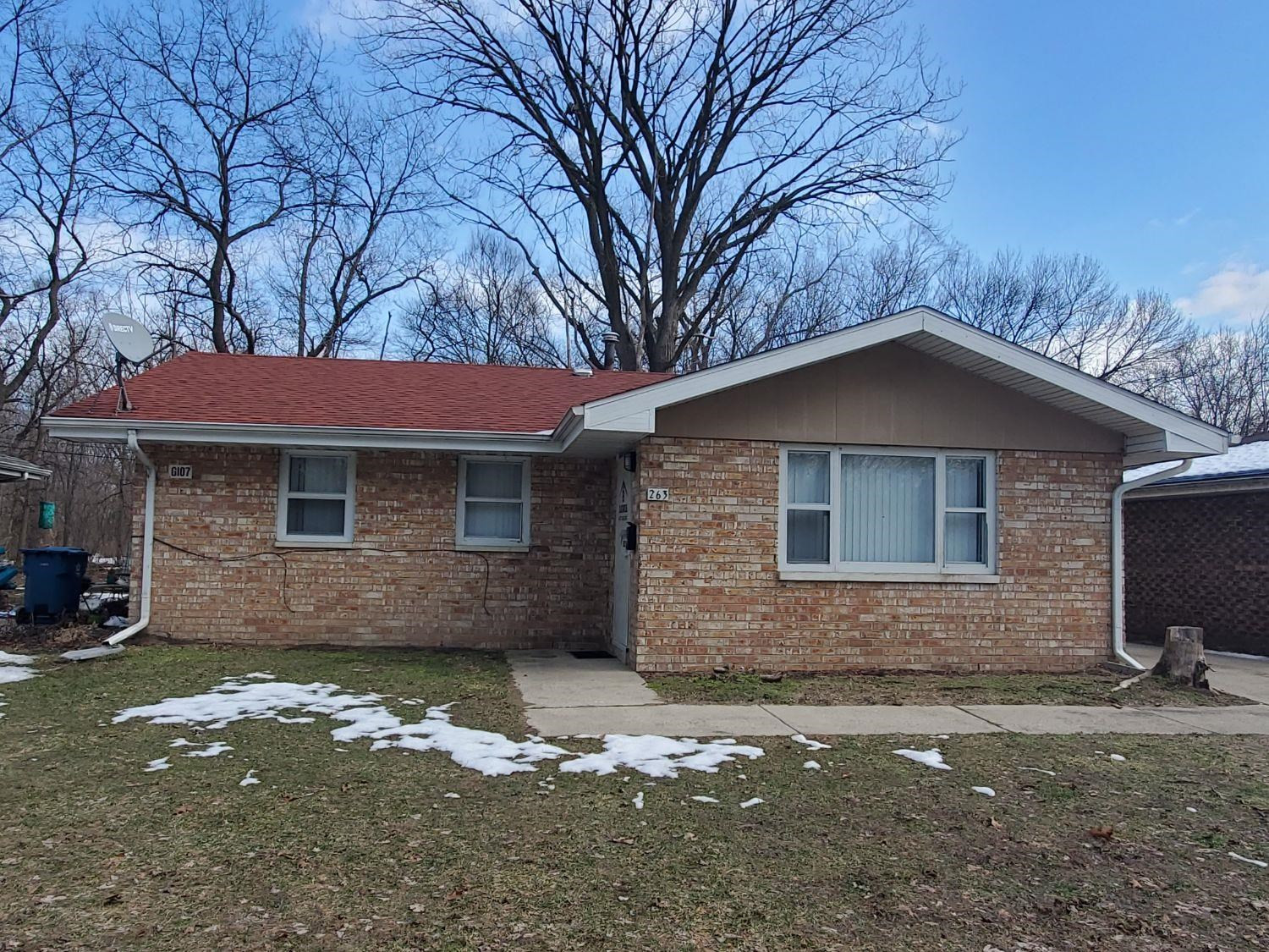 263 Hamlin Street Gary, IN 46406 - Photo 1 of 6 a front view of a house with a yard