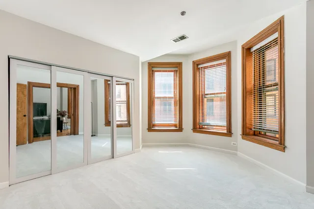 a view of hallway with a bedroom