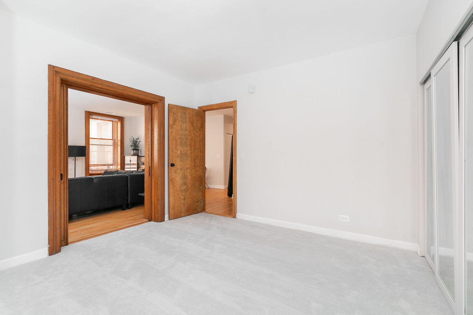 550 West Surf Street, Unit C316 Chicago, IL 60657 - Photo 13 of 16 a view of hallway with a bedroom