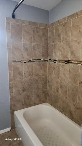 a bathroom with a bathtub