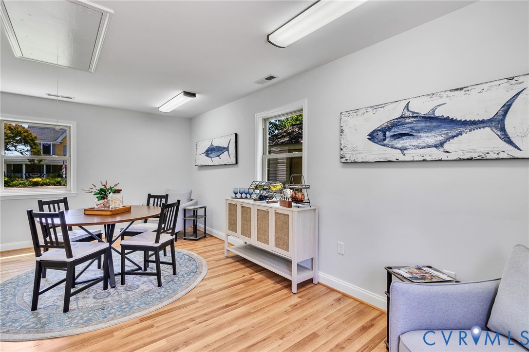 618 Main Street Reedville, VA 22539 - Photo 27 of 54 Bright room with wood flooring, two large windows,