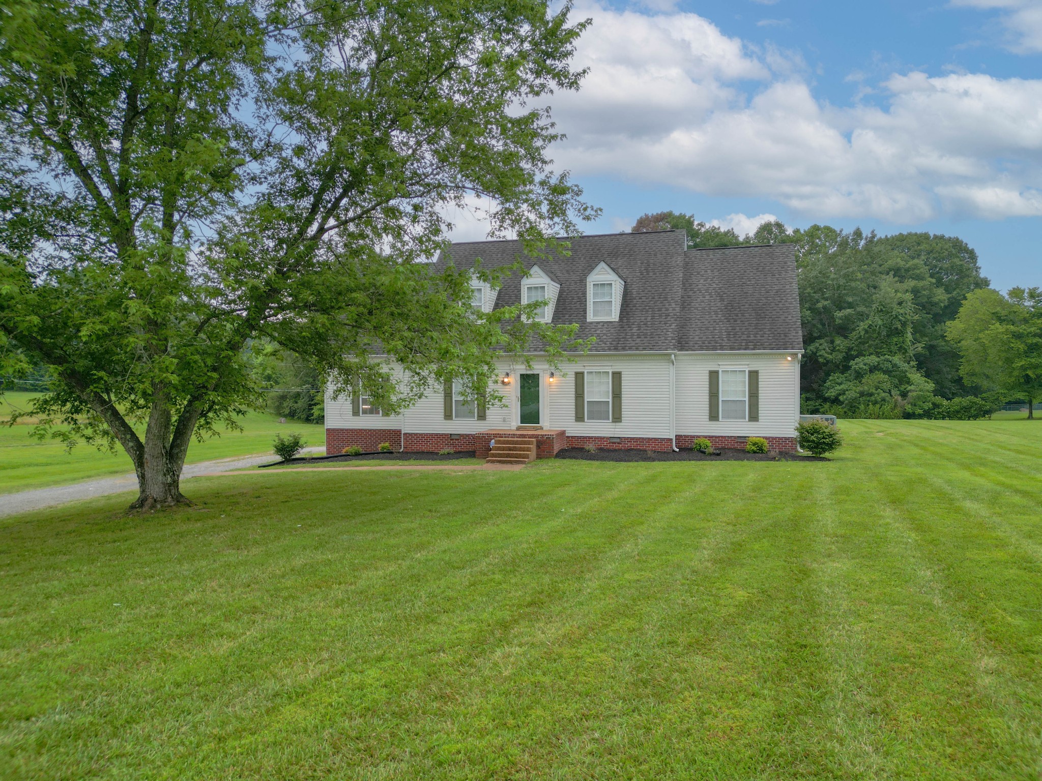 2558 South Mt Pleasant Road Greenbrier, TN 37073 - Photo 2 of 36 a view of a house with a yard