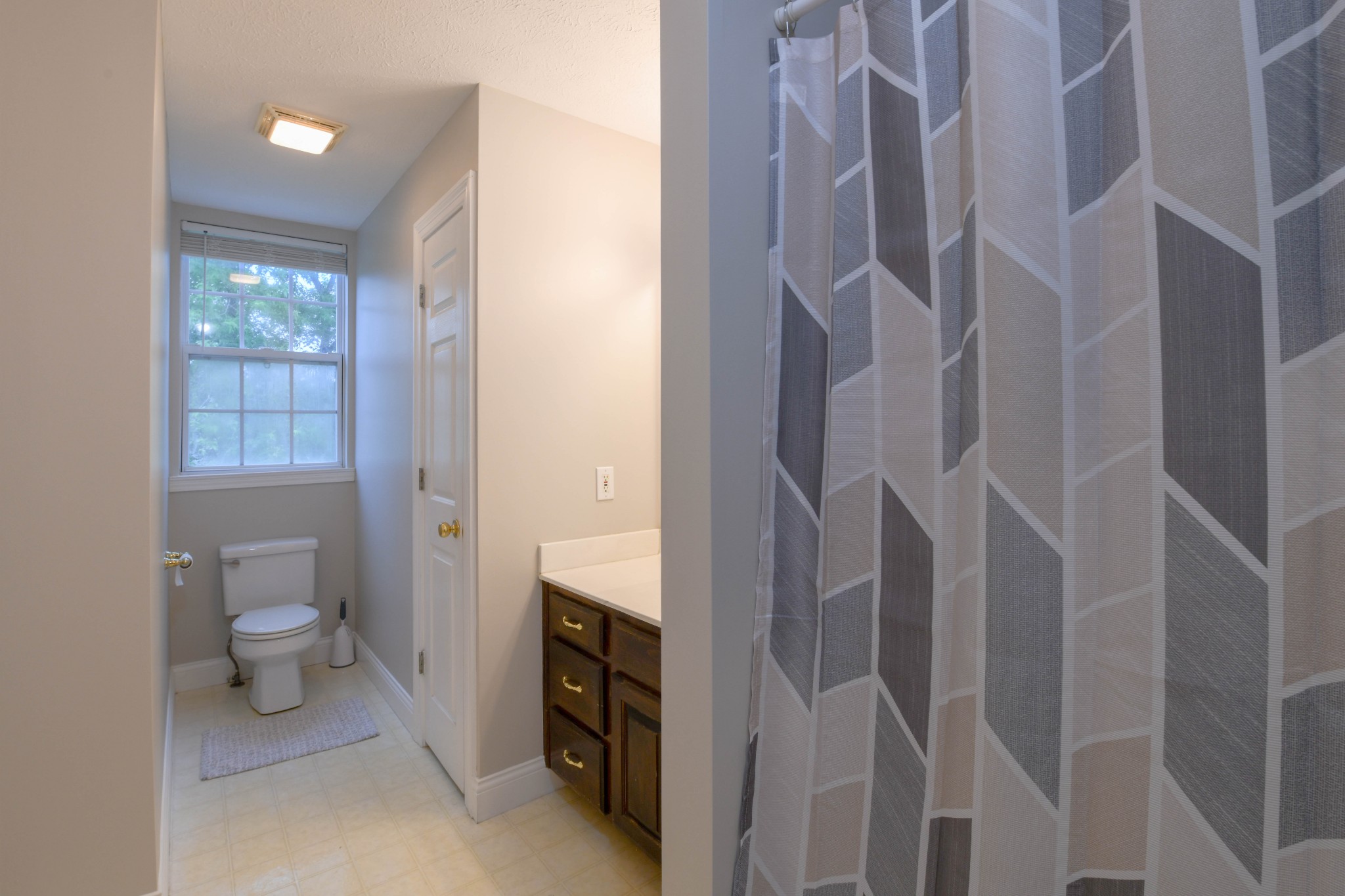2558 South Mt Pleasant Road Greenbrier, TN 37073 - Photo 27 of 36 a bathroom with a granite countertop sink and a toilet
