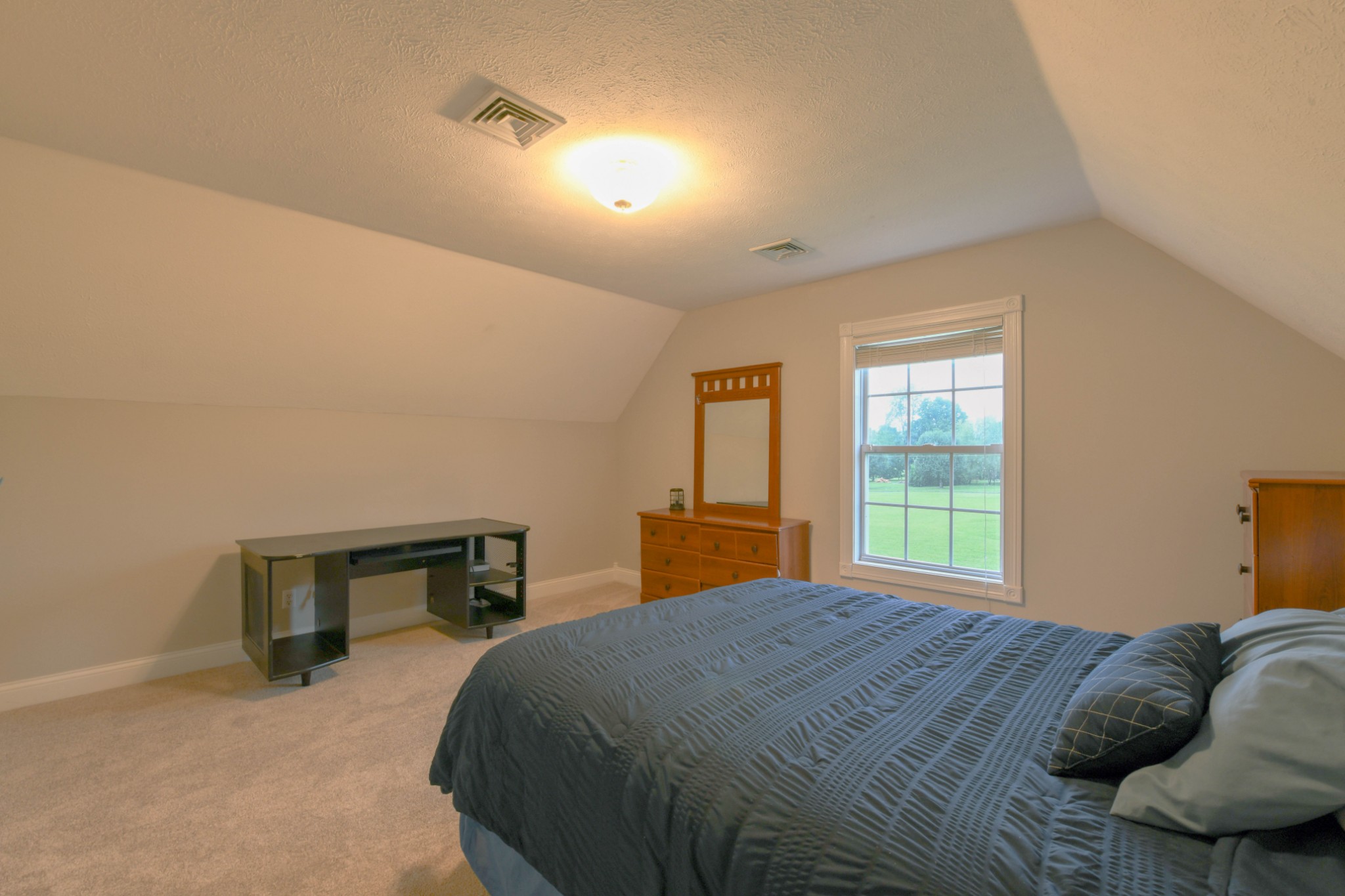 2558 South Mt Pleasant Road Greenbrier, TN 37073 - Photo 29 of 36 a bedroom with a bed and a window