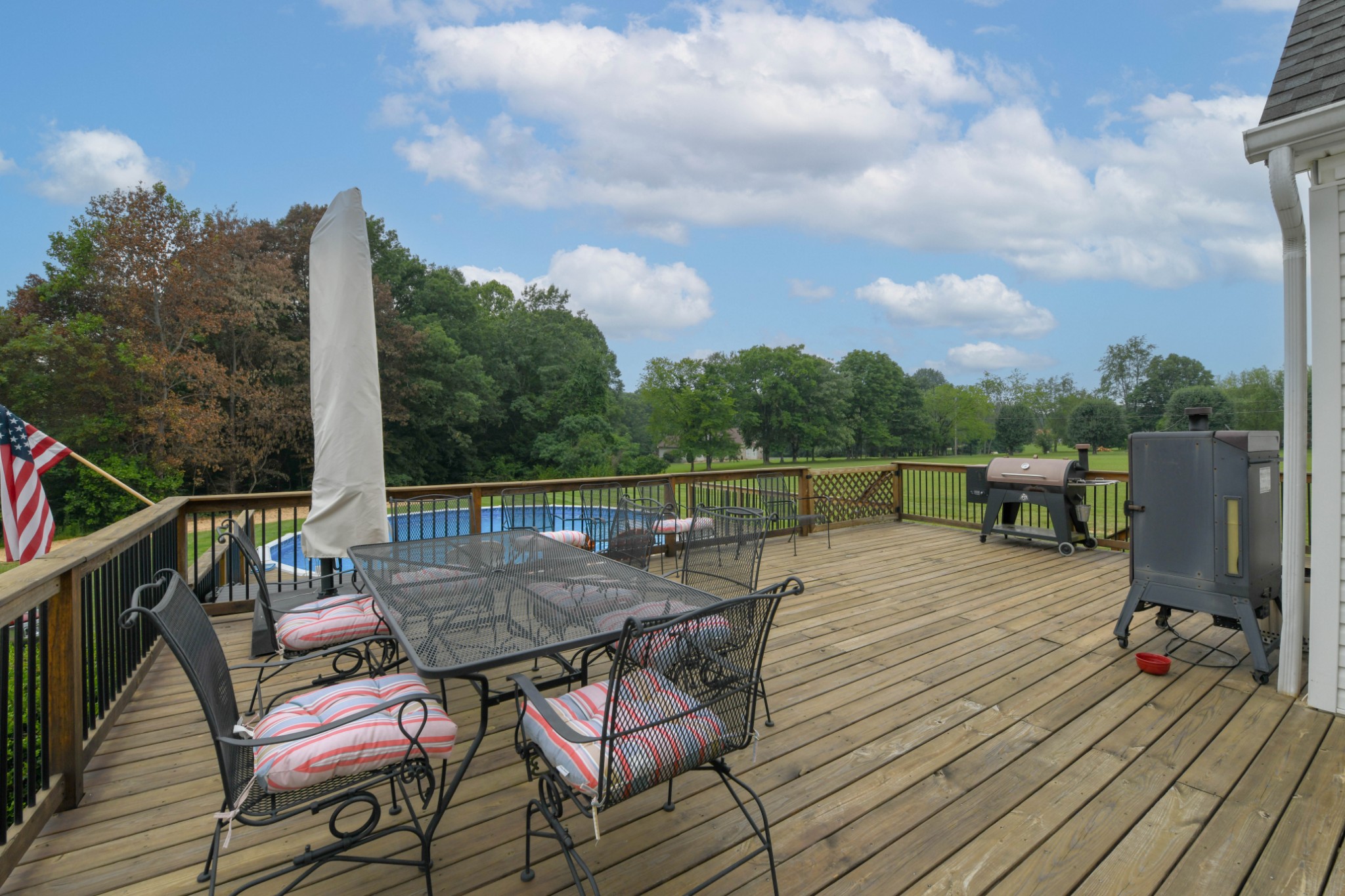 2558 South Mt Pleasant Road Greenbrier, TN 37073 - Photo 30 of 36 a view of a balcony with wooden floor and outdoor seating