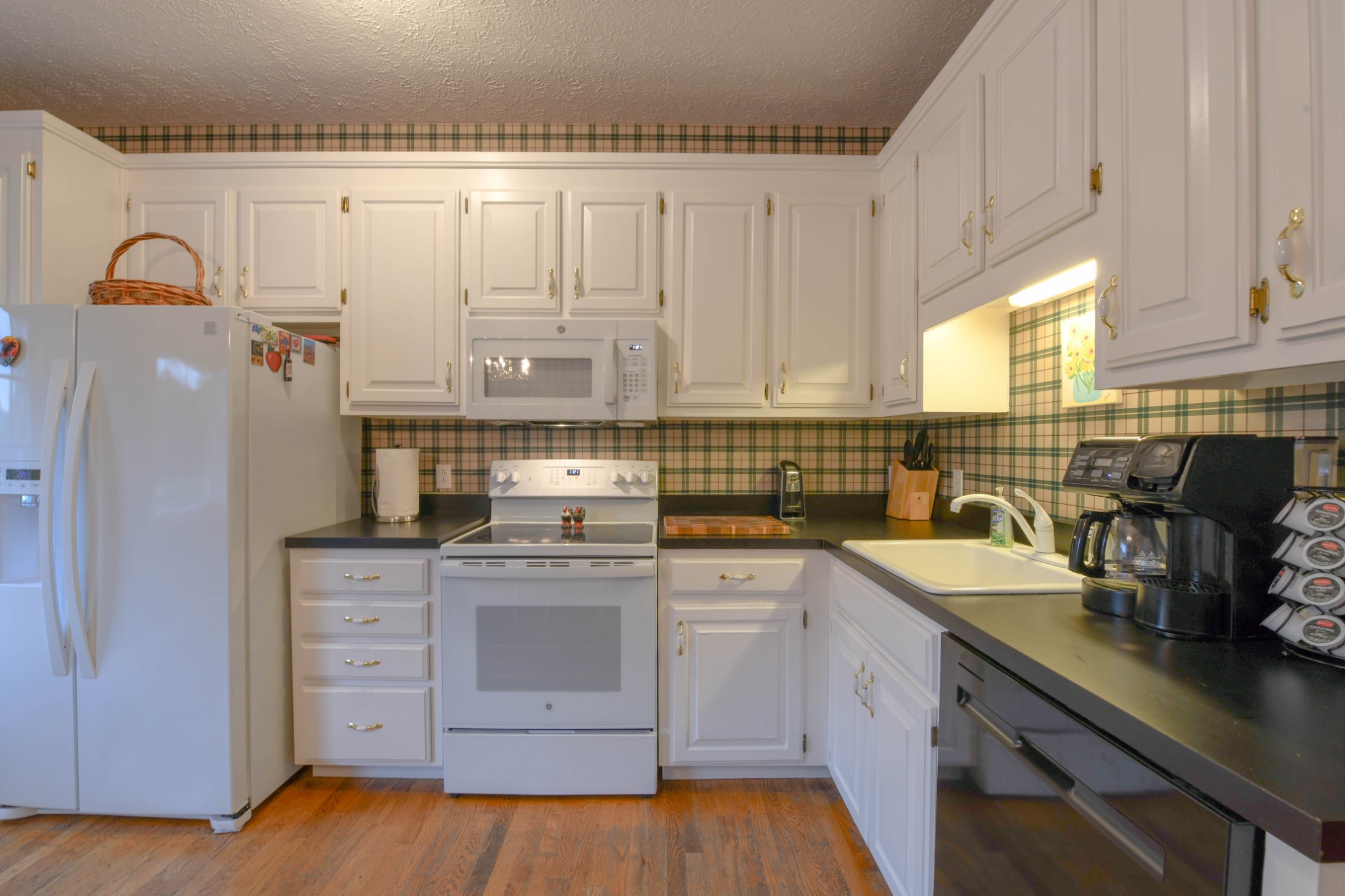 2558 South Mt Pleasant Road Greenbrier, TN 37073 - Photo 10 of 36 a kitchen with stainless steel appliances granite countertop a sink a stove and cabinets
