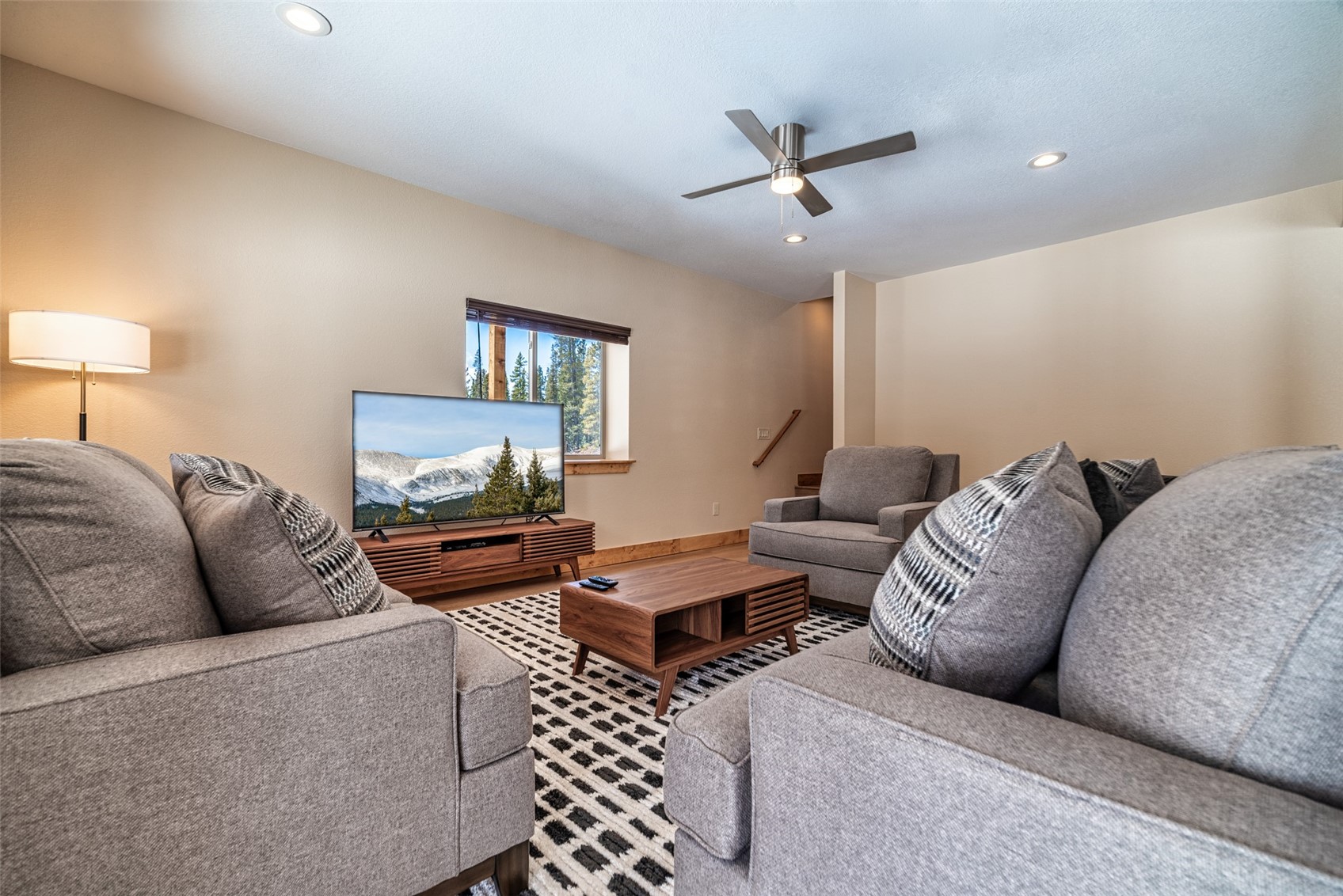 526 Porcupine Road Fairplay, CO 80440 - Photo 30 of 45 a living room with furniture a rug and a ceiling fan