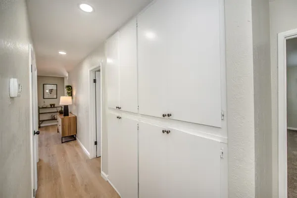 a view of a room with rack on the wall