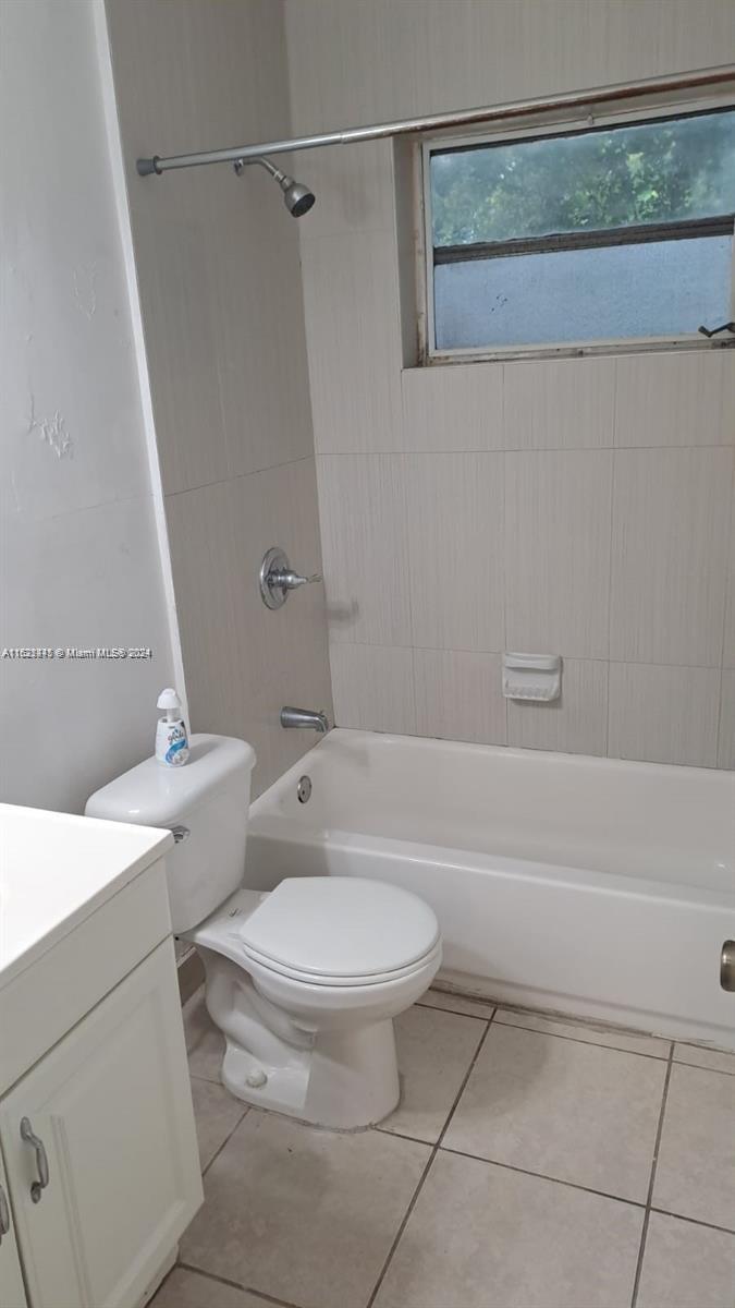 3265 Griffin Road, Unit 104 Dania Beach, FL 33312 - Photo 13 of 14 a bathroom with a toilet and a shower