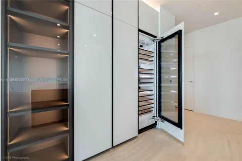 a bathroom with a shower and a sink