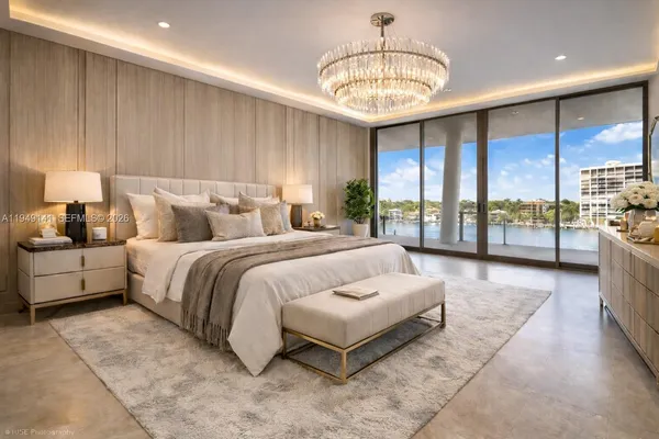 an empty room with floor to ceiling window and windows