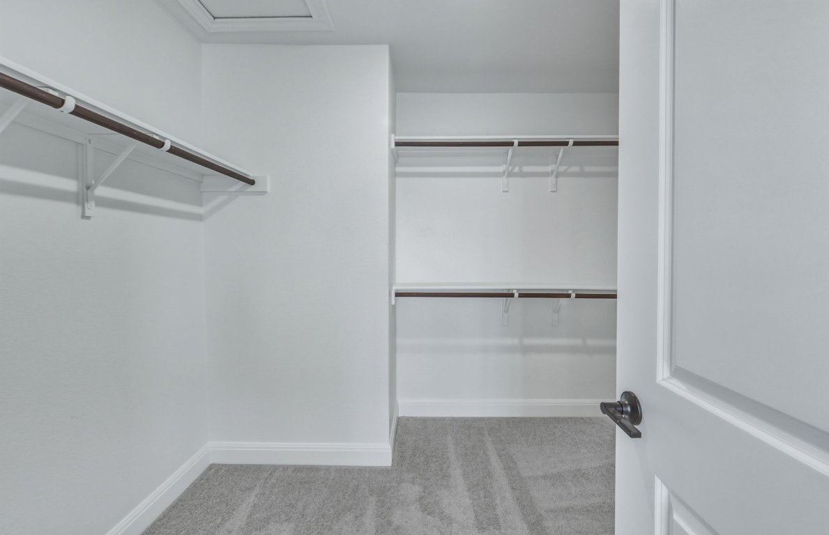 213 Regatta Trail Leander, TX 78641 - Photo 14 of 26 a view of an empty walk in closet