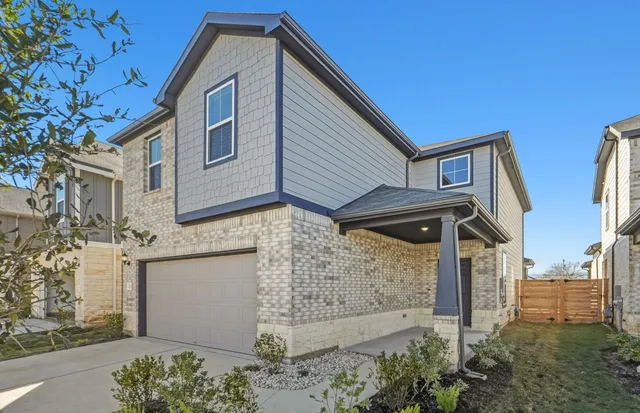 a front view of multi story residential apartment building