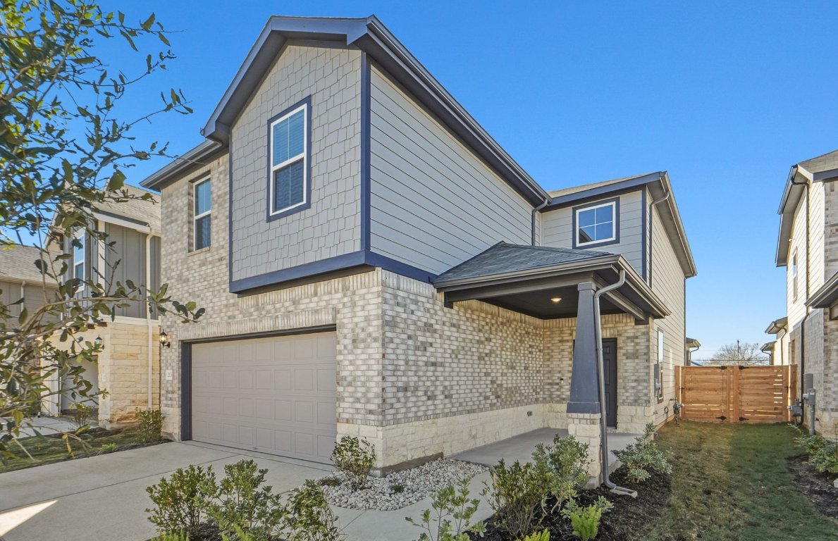 213 Regatta Trail Leander, TX 78641 - Photo 2 of 26 a front view of multi story residential apartment building