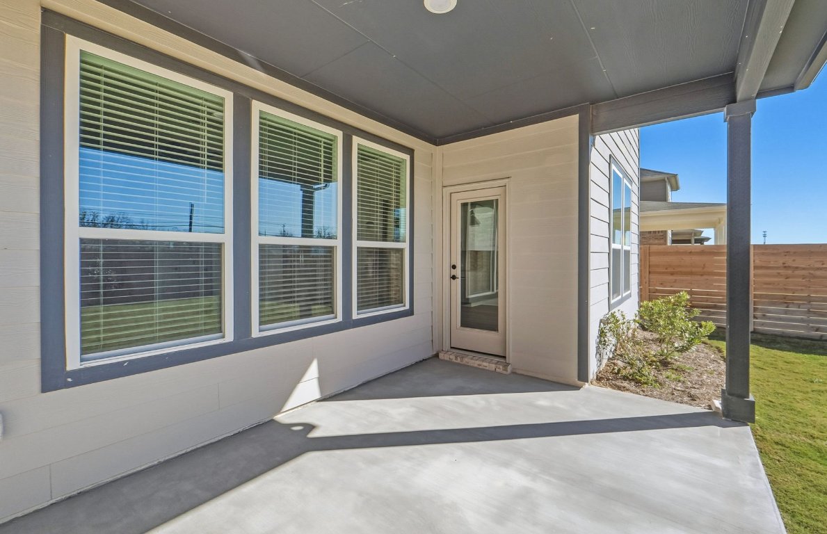 213 Regatta Trail Leander, TX 78641 - Photo 23 of 26 a view of an empty room with a window