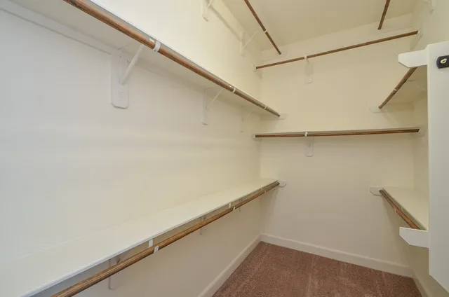 a view of a room with racks on the wall