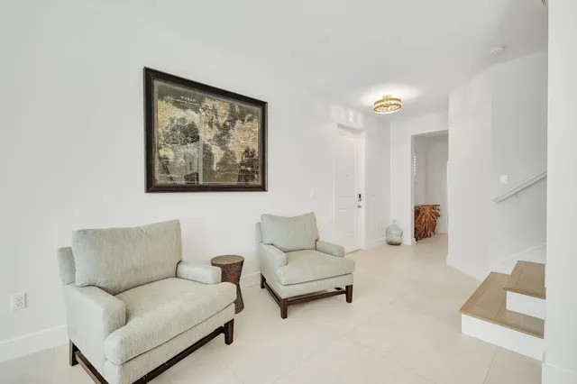 a living room with furniture and a couch