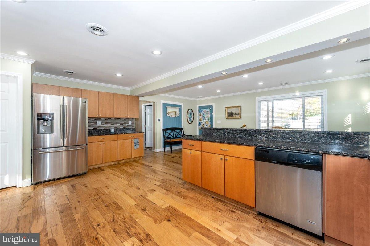 1306 3rd Road Middle River, MD 21220 - Photo 13 of 60 Modern kitchen with sleek finishes.
