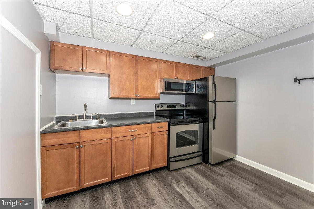1306 3rd Road Middle River, MD 21220 - Photo 19 of 60 Modern kitchen with sleek finishes.