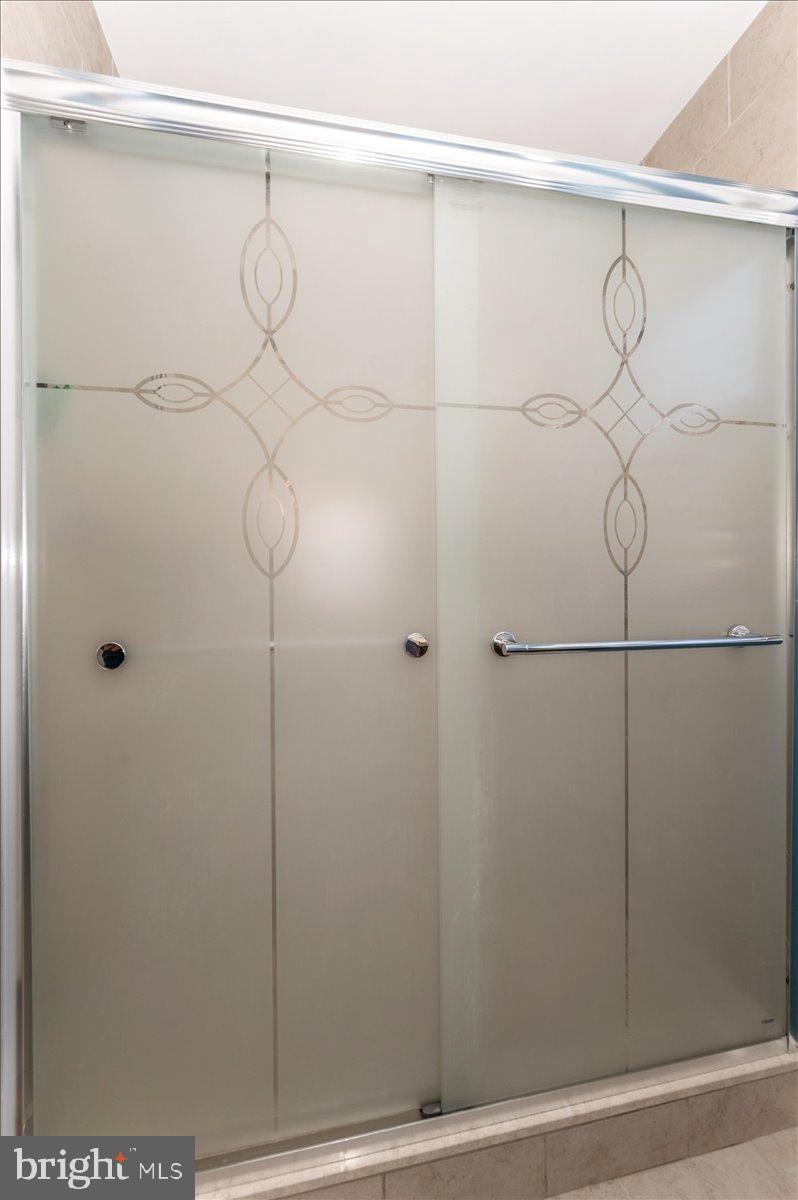 1306 3rd Road Middle River, MD 21220 - Photo 31 of 60 Elegant frosted glass shower doors.