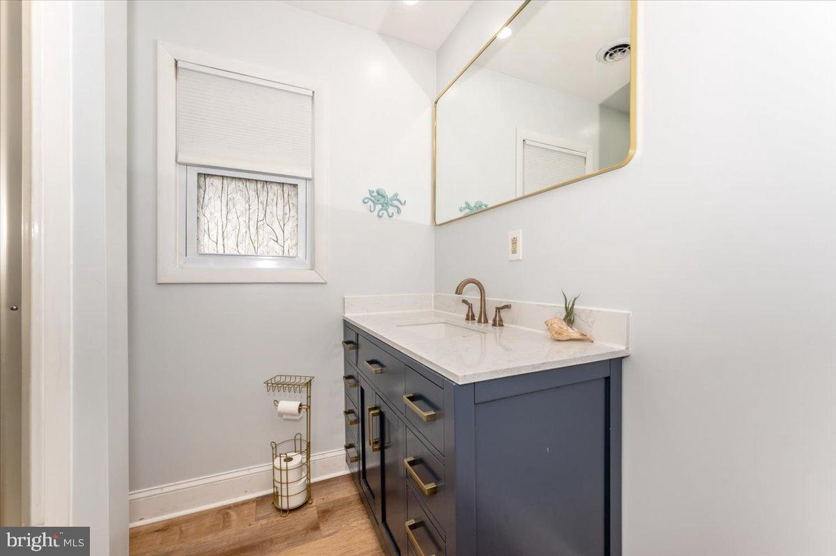 1306 3rd Road Middle River, MD 21220 - Photo 35 of 60 Sleek modern bathroom with stylish accents.