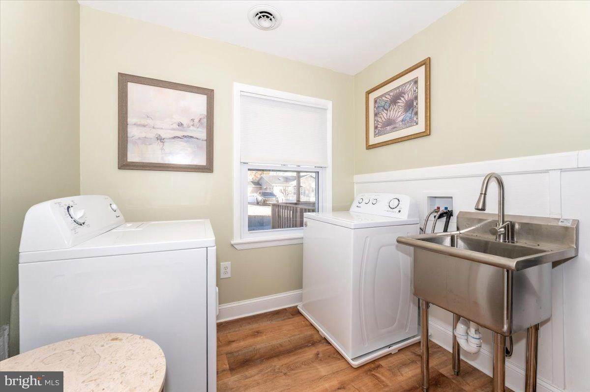 1306 3rd Road Middle River, MD 21220 - Photo 38 of 60 Bright and functional laundry space.