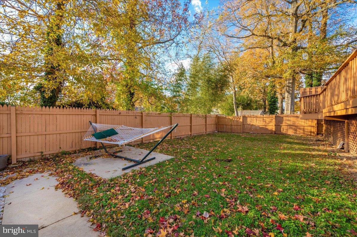 1306 3rd Road Middle River, MD 21220 - Photo 49 of 60 Serene backyard oasis with autumn hues.