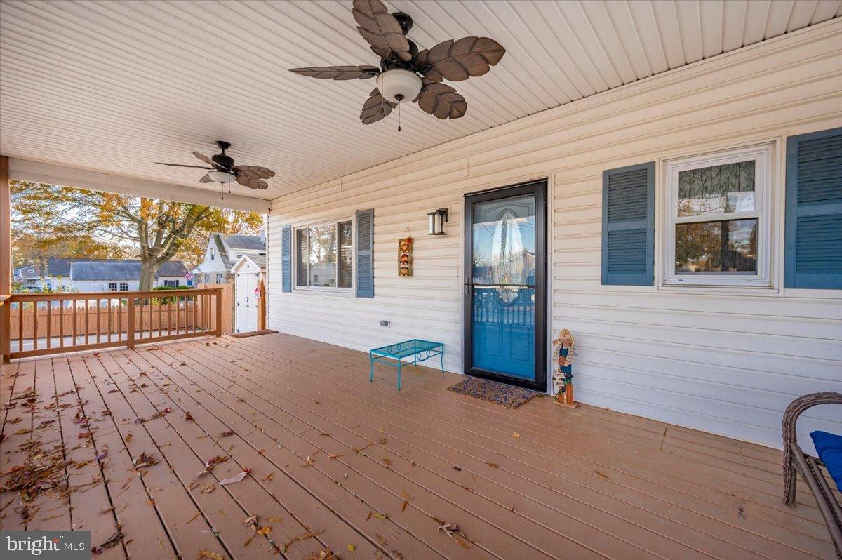 1306 3rd Road Middle River, MD 21220 - Photo 58 of 60 Charming porch with inviting outdoor space.