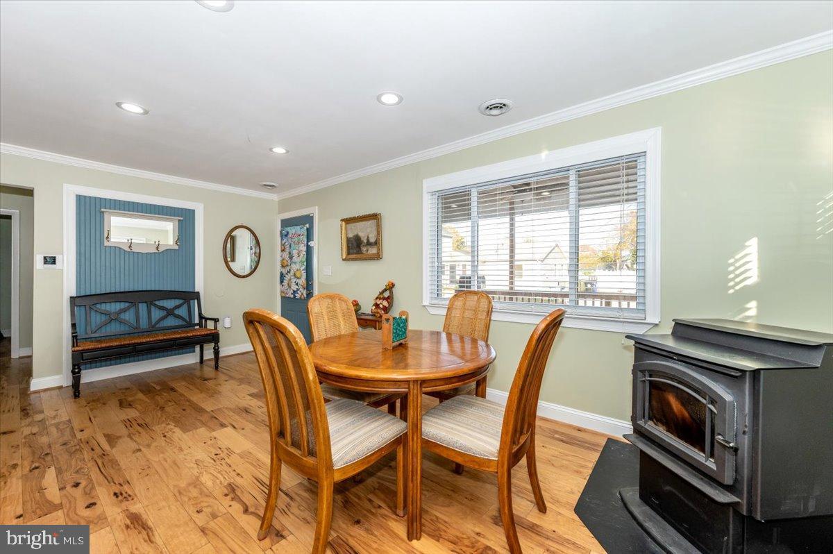 1306 3rd Road Middle River, MD 21220 - Photo 7 of 60 Cozy dining area with warm wooden accents.