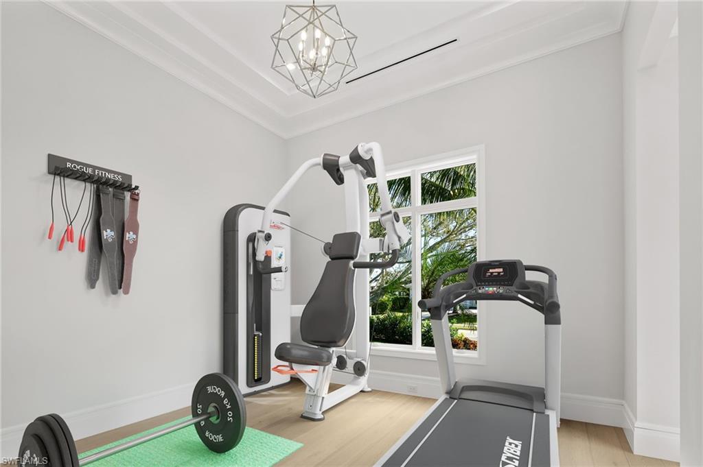 292 Bahia Point Naples, FL 34103 - Photo 24 of 50 a view of a room with gym equipment