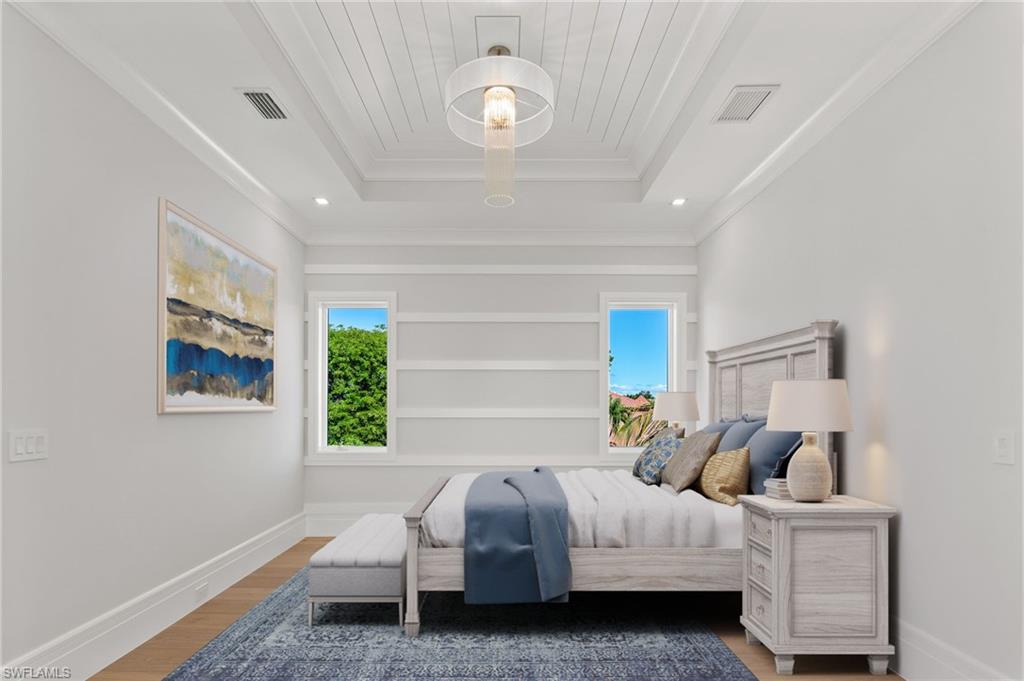 292 Bahia Point Naples, FL 34103 - Photo 36 of 50 a bedroom with bed and window