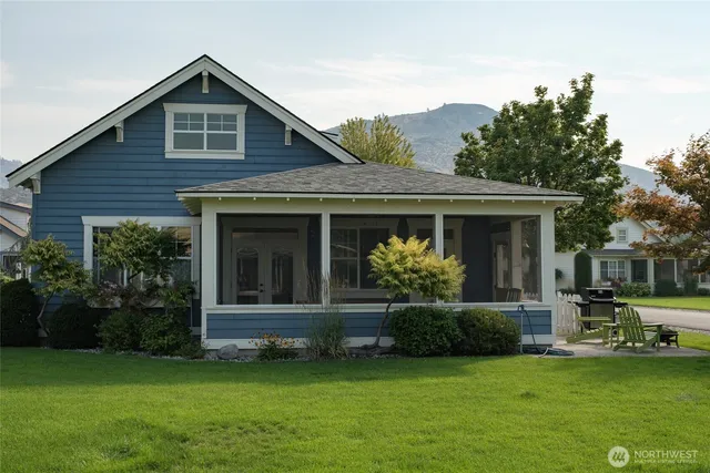 a view of a balcony with table and chairs