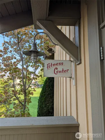 an outdoor space with furniture and garden