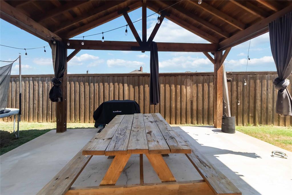 1663 Fraser Drive Burleson, TX 76028 - Photo 18 of 22 View of patio / terrace featuring outdoor dining space