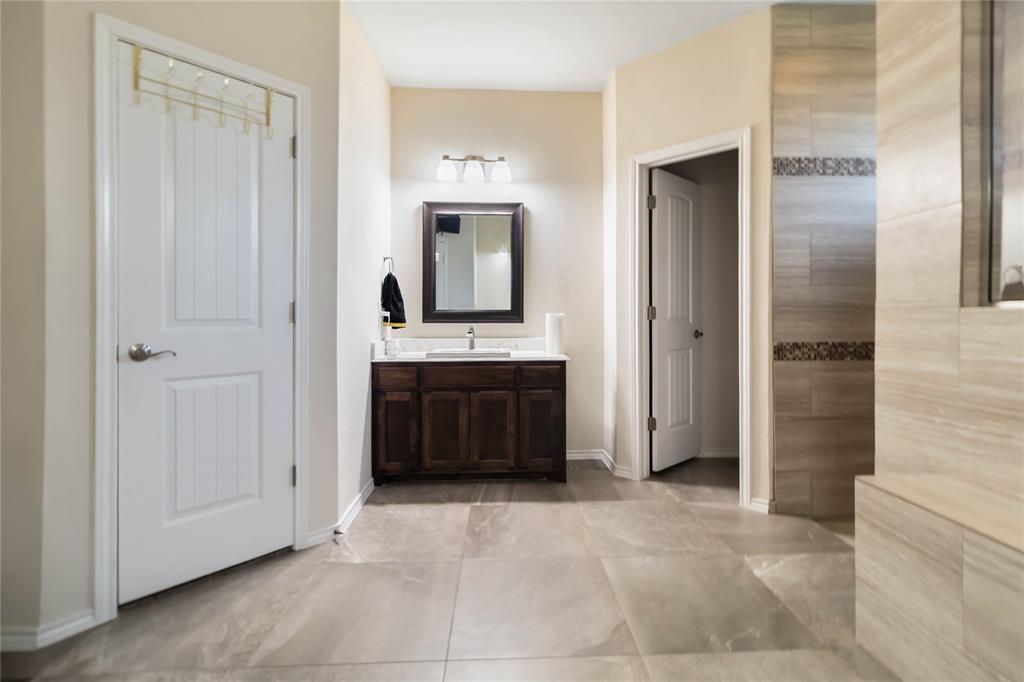1663 Fraser Drive Burleson, TX 76028 - Photo 8 of 22 Full bathroom with vanity and light tile patterned flooring